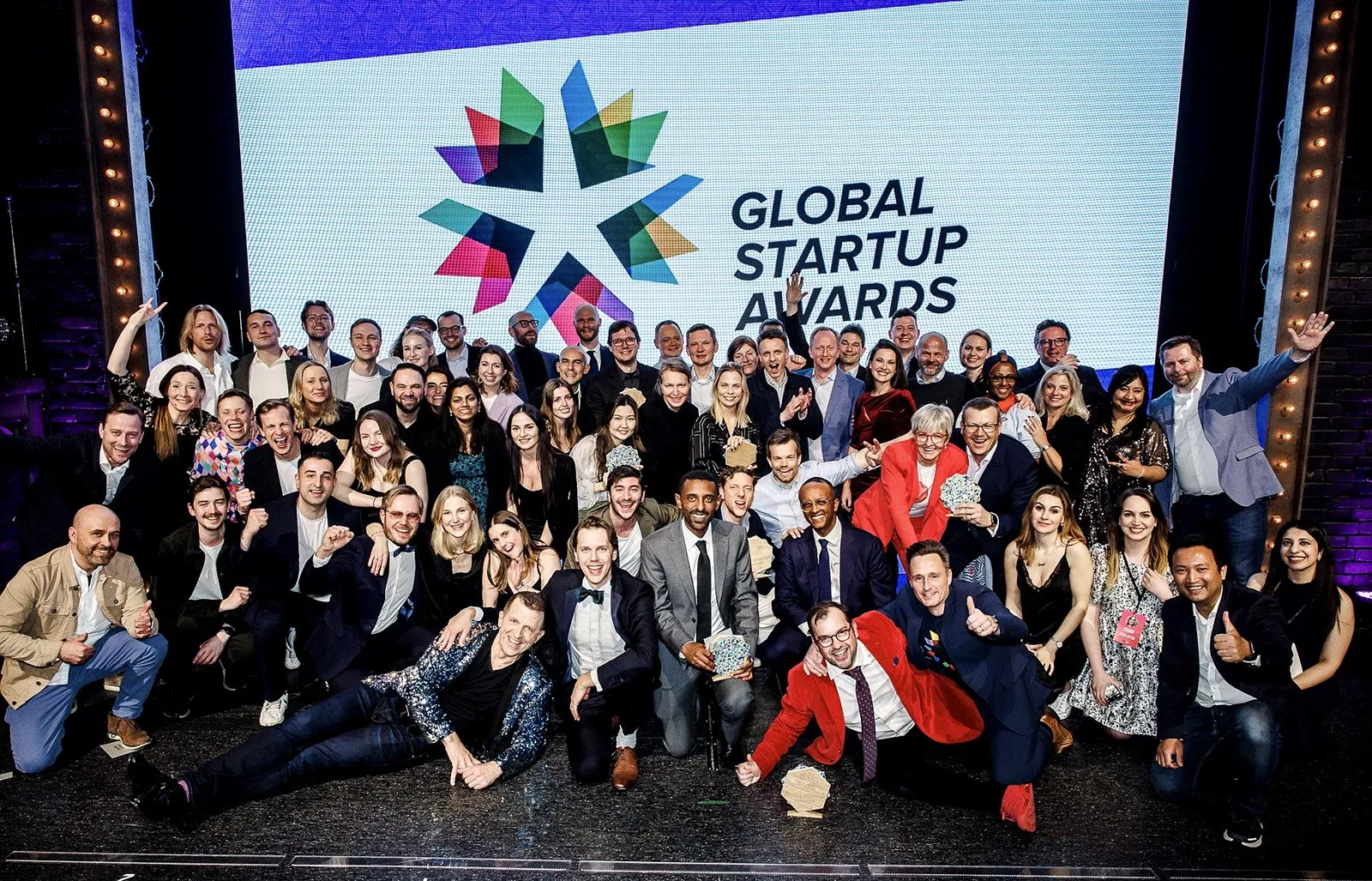The 2023 Global Startup Awards winners on stage under the GSA logo in Copenhagen